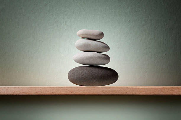 calhaus equilibrado - aspirations pebble balance stack imagens e fotografias de stock