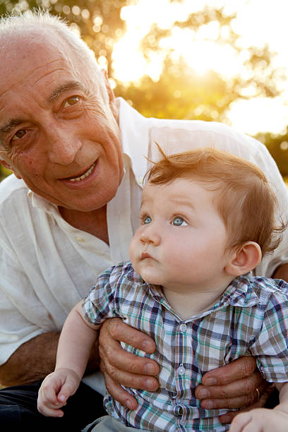 istock Grandfather and nephew close up 175535272