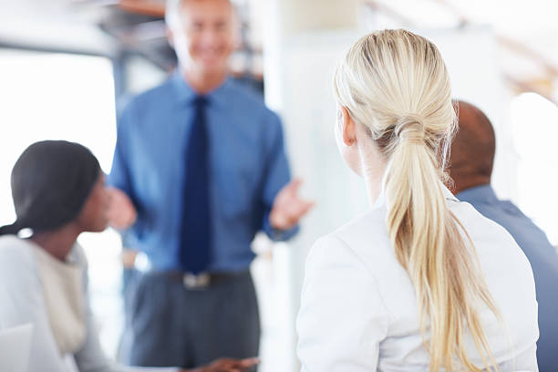 istock Focused on what her boss has to say 175536004
