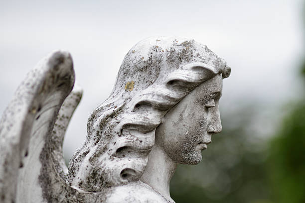 istock Profile white marble head of angel 175536535