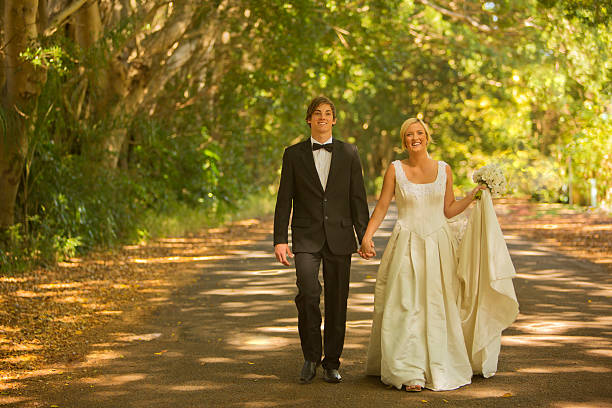istock Newly Married Couple Walking 175536667