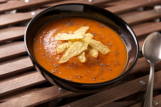 Tomato and Basil Soup with Tortilla stock photo