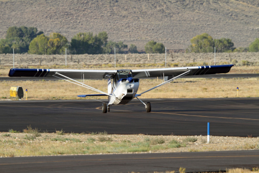 Single engine private airplane at a Wyoming airport.