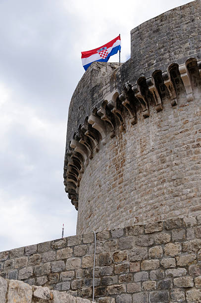 Croatian Flag flying on Minceta tower in Dubrovnik, Croatia "Croatian Flag flying on Minceta tower in Dubrovnik, Croatia" fort minceta dubrovnik stock pictures, royalty-free photos & images