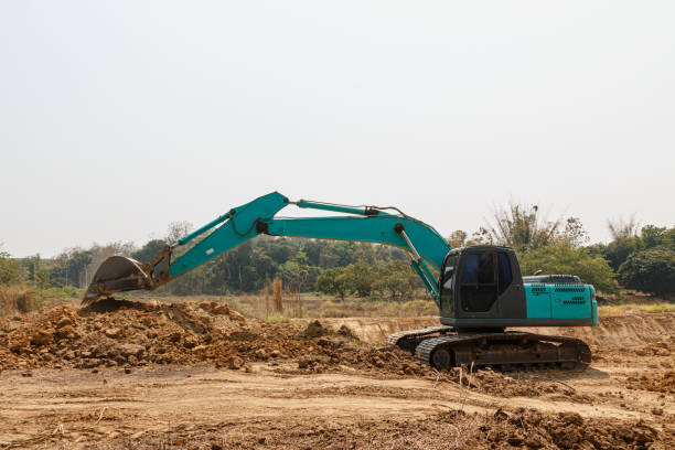 istock Cyan Excavators are digging the soil 1755389834