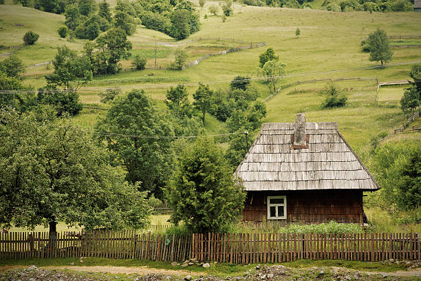 Wooden house in Ukraine "Wooden house in Ukraine. Location: Synevyr, Carpathian mountains, Ukraine." ukrainian village stock pictures, royalty-free photos & images