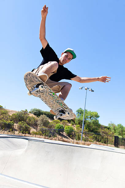 スケートボードトリック - skateboard park skateboarding practicing stunt ストックフォトと画像