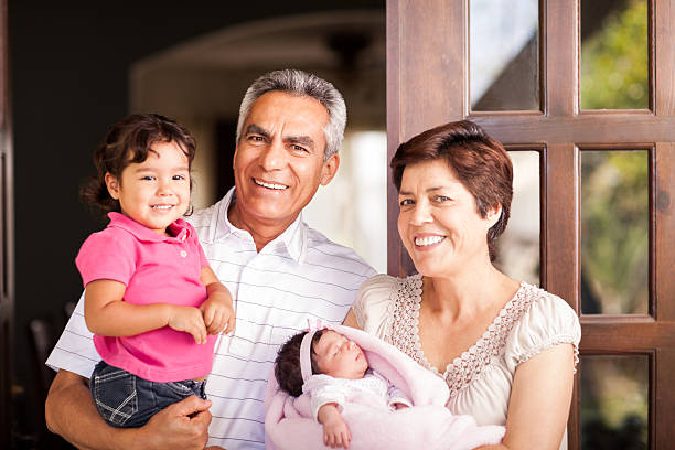 Grandparents and grandchild outdoors in summer