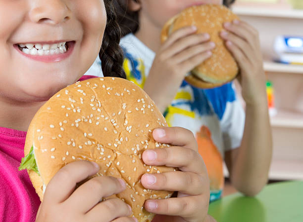 istock Boy And Girl With Hamburgers 175539863