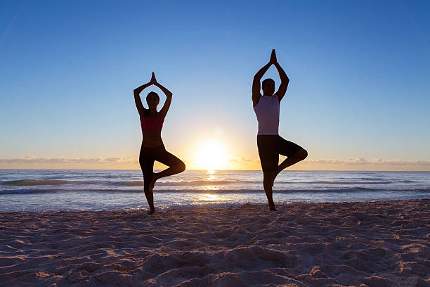 istock Young couple doing yoga 175539980