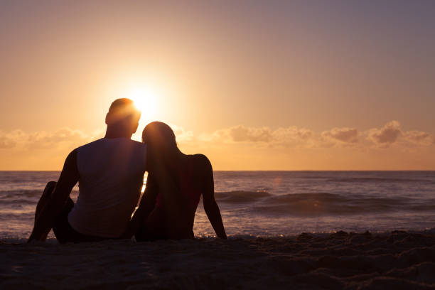 istock Couple watching the sunrise 175540151
