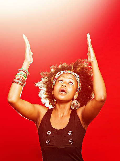 istock Young woman inspired by heavenly light 175540366