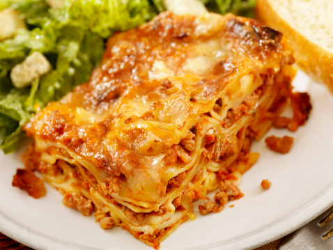 Authentic Italian Meat Lasagna with Caesar Salad and Foccacia Bread  -Photographed on Hasselblad H3D2-39mb Camera