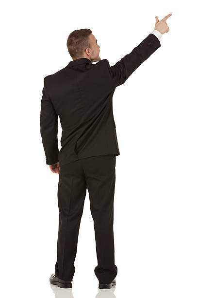 istock Rear view of a businessman pointing 175541474