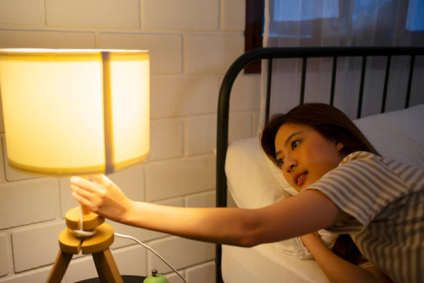 A woman go to sleep at night.