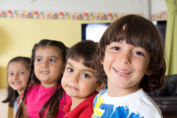 istock Group of preschool kids in classroom 175541681