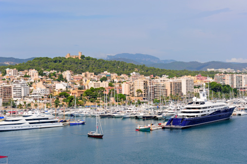 Marina in Palma De Majorca with Bellver castle on the hill
