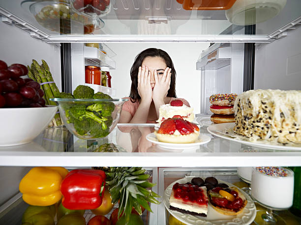 istock Woman Looking secretly to a Cake 175542514