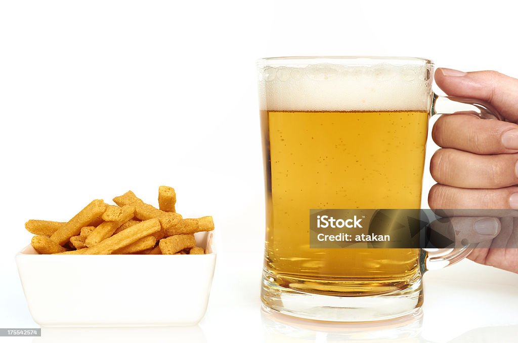 Beer glass and chips Man holding beer glass Adult Stock Photo