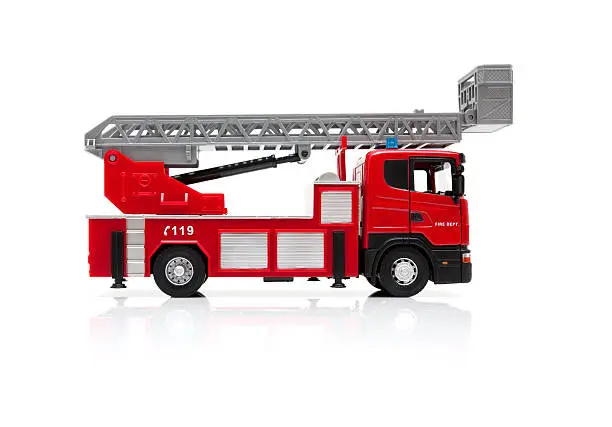 Photo of Toy Fire Engine isolated on white background