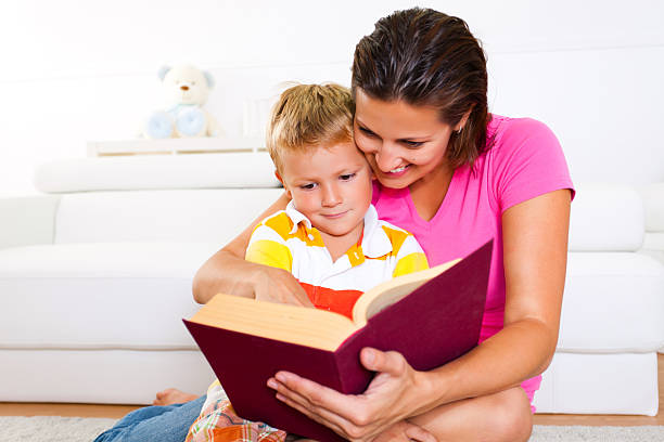 istock Mother reading to her son 175543070