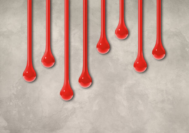 istock Red ink drops on light concrete wall. Horizontal wallpaper 1755432594