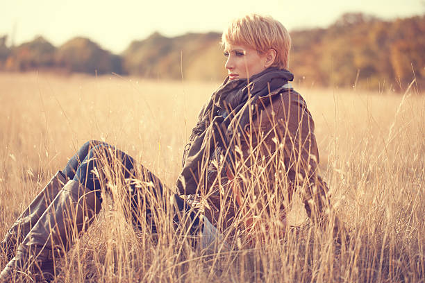 istock Young woman in meadow 175543394