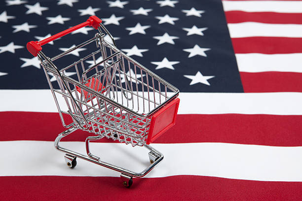 consumismo: carrinho de compras com bandeira dos estados unidos da américa - buy usa american culture made in the usa imagens e fotografias de stock