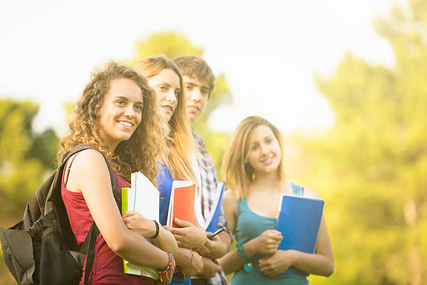 istock College student on a campus cheerful toghether 175543560