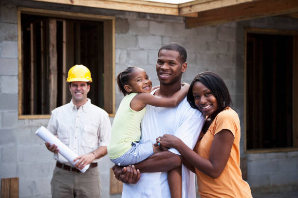 istock Family in front of house under construction 175543690