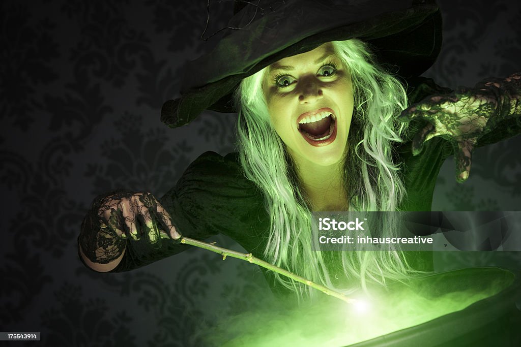Halloween Witch Conjuring A Spell http://dieterspears.com/istock/links/button_halloween.jpg Witch Stock Photo