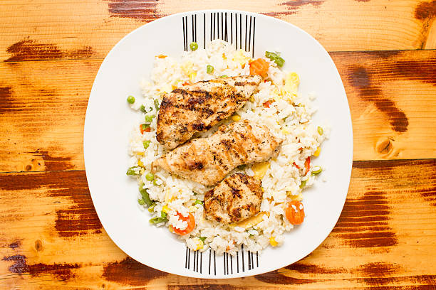 istock Rice with eggs, vegetables and chicken breast 175544741
