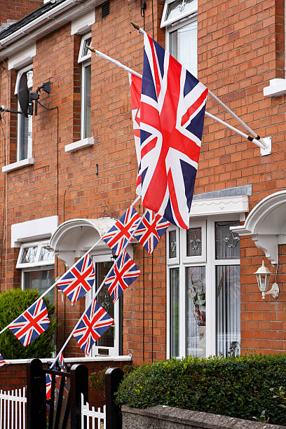 istock Patriotic British flags fly from Belfast house 175544925