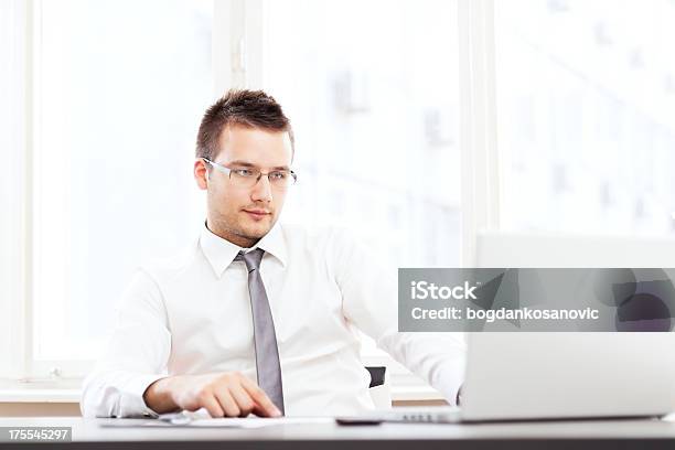 Portrait Businessman With A Laptop At Office Stock Photo - Download Image Now - 30-39 Years, Adult, Adults Only
