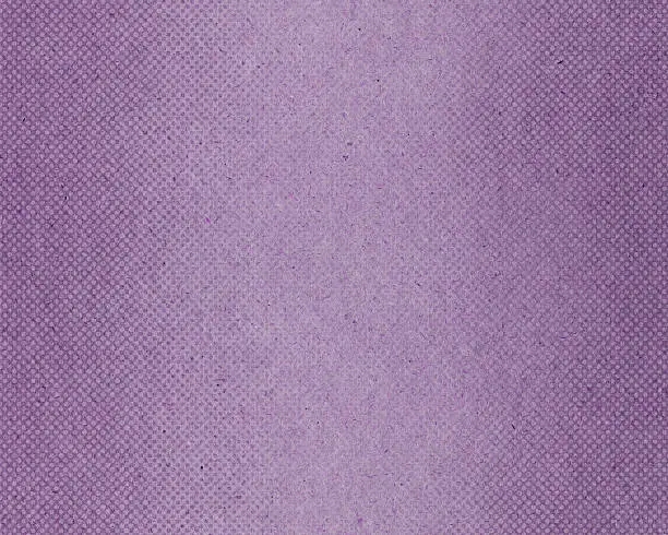 Photo of mauve textured paper with halftone