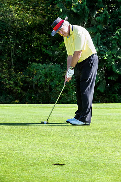 istock Senior Golfer on Putting Green 175546180