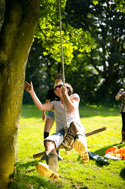 310+ Girl Swinging On A Tree Rope Swing Stock Photos, Pictures