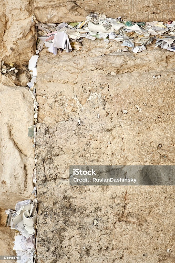 The western wall, Jerusalem. Notes in the Wailing Wall in Jerusalem,Israel. Wall background. Capital Cities Stock Photo