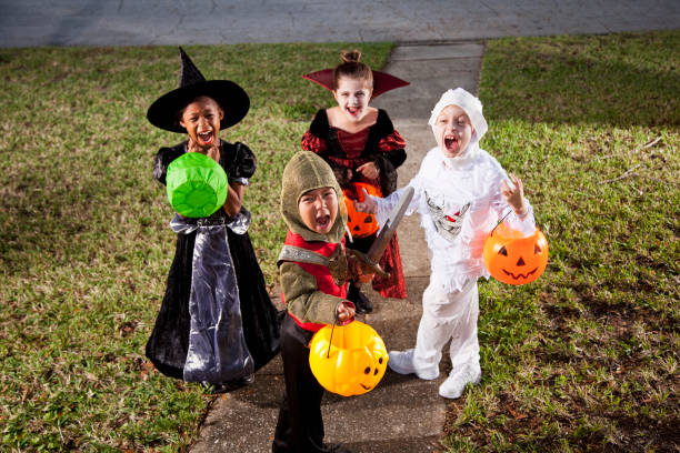 istock Children in halloween costumes 175546710