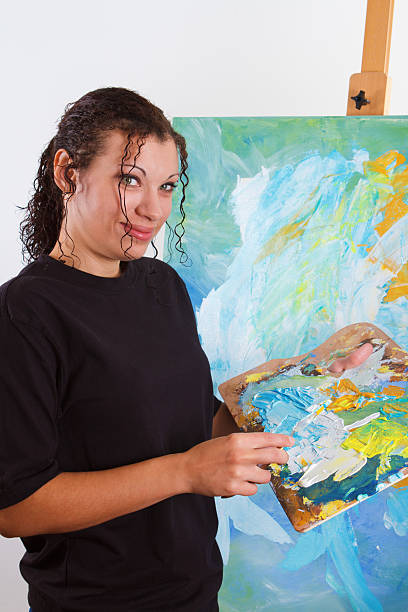 istock Young Woman Painting An Abstract 175546849