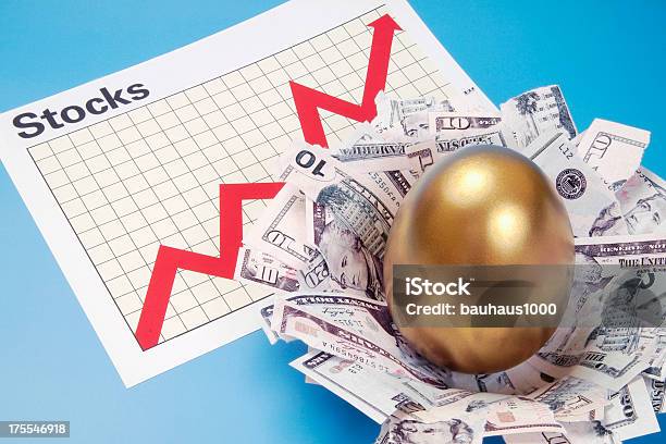 Stocks Nest Egg Stock Photo - Download Image Now - Gold Colored, Egg - Food, Nest Egg