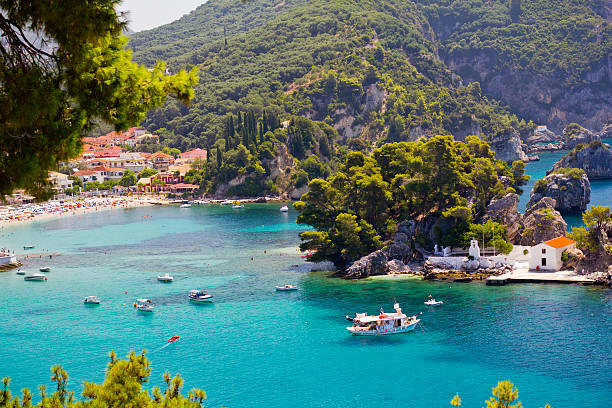 Parga, Greece A view of popular tourist town of Parga in Greece parga greece stock pictures, royalty-free photos & images