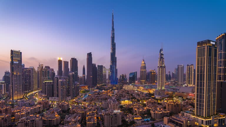 Day to Night Timelapse View of Modern Skyscrapers in Downtown Dubai, United Arab Emirates (UAE), Zoom In