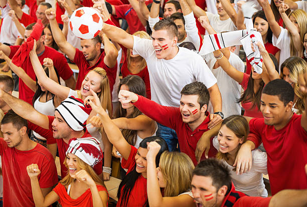 istock Group of ecstatic football fans cheering. 175548173