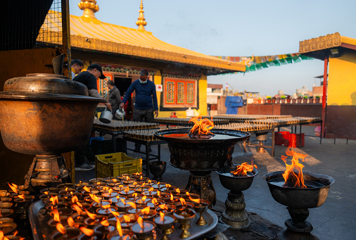 Manufacturing of religious candles in buddhist temple