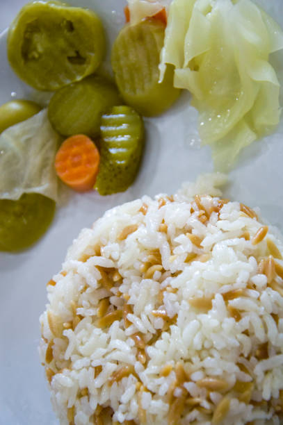 istock rice pilaf and pickles 1755490460