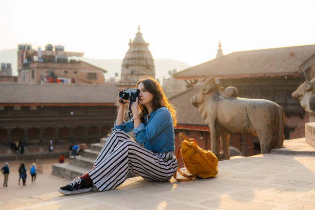 istock Woman with camera exploring Bhaktapur 1755491585