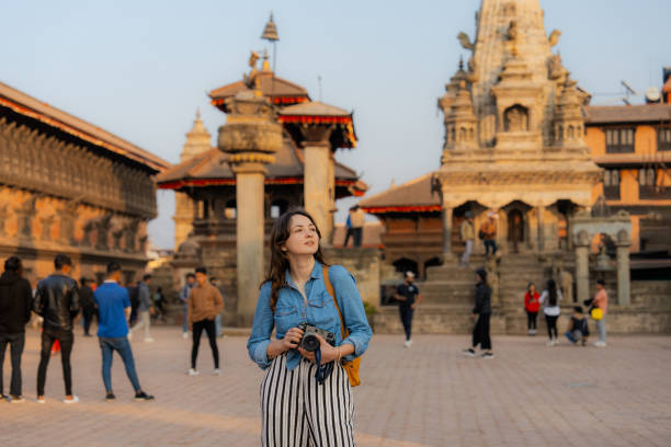 istock Woman with camera exploring Bhaktapur 1755493929