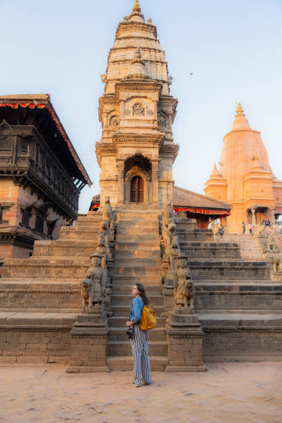istock Woman with camera exploring Bhaktapur 1755495636