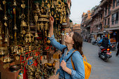 Woman choosing souvenirs in Kathmandu, Nepal